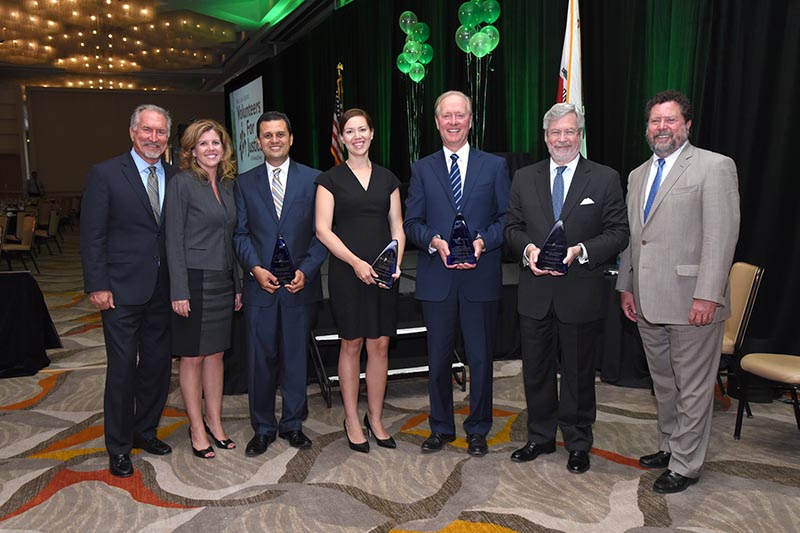 (Left to Right) Mark Erickson, Deborah Mallgrave, Cesar Covarrubias, Lindsey E. Martinez, Guy Halgran, Randy Oppenheimer and Ken Babcock.